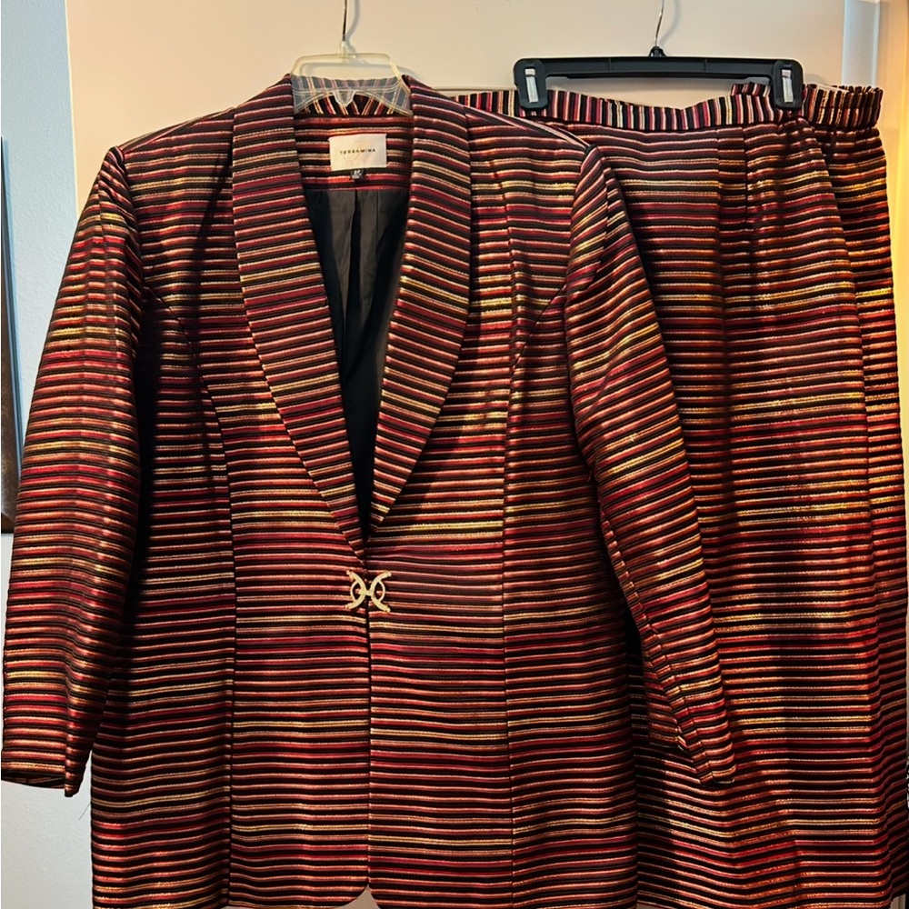Beautiful red, black and gold suit.
